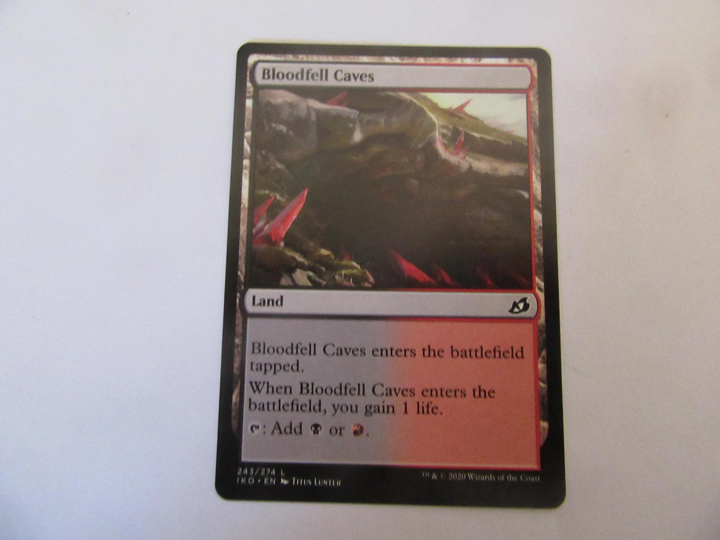 Bloodfell Caves 243 Ikoria: Lair of Behemoths NM